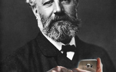 jules vernes avec un telephone portable dans les mains